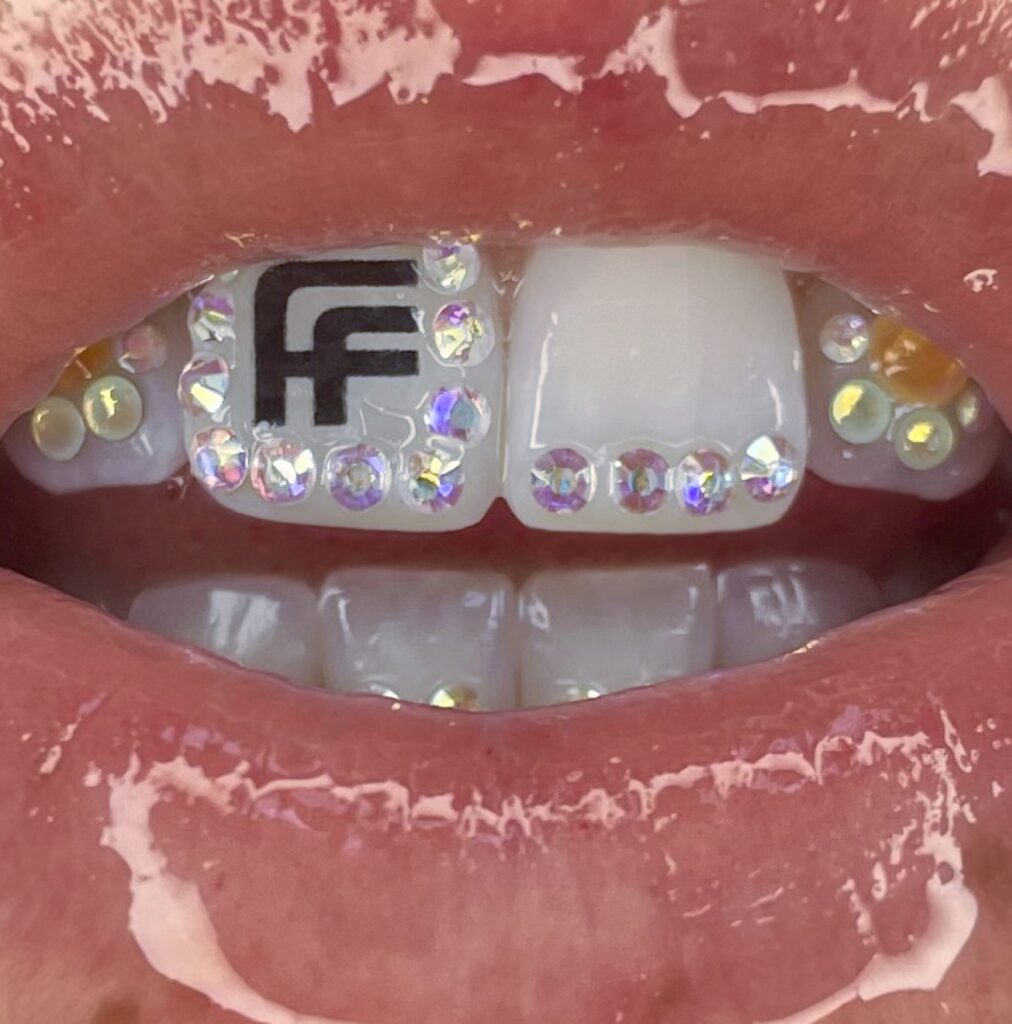 tooth tattoo farfetch fuse toothgem